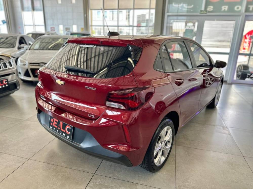 CHEVROLET - ONIX - 2022/2023 - Vinho - R$ 75.900,00
